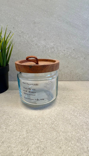 Transparent egengjord etikett på glasburk Niimbot